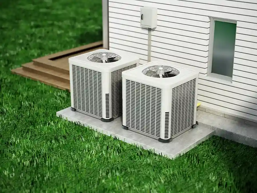 Heat Pump Repair In Ellenwood, GA 1 Two outdoor air conditioning units on a concrete slab beside a house with white siding, electrical box, and wooden steps leading to a deck