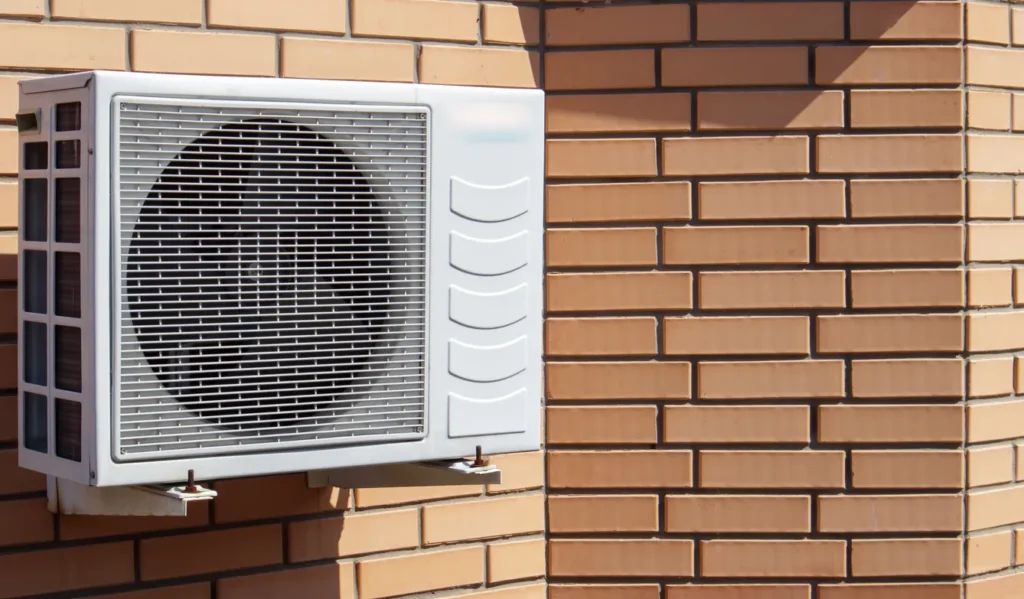 Mini Split AC in Stonecrest, GA 1 MIni Split System hanged outside a home wall