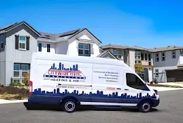 Ultimate Guide to AC Repair & Troubleshooting 3 Local HVAC technician consulting with a homeowner about AC repairs
